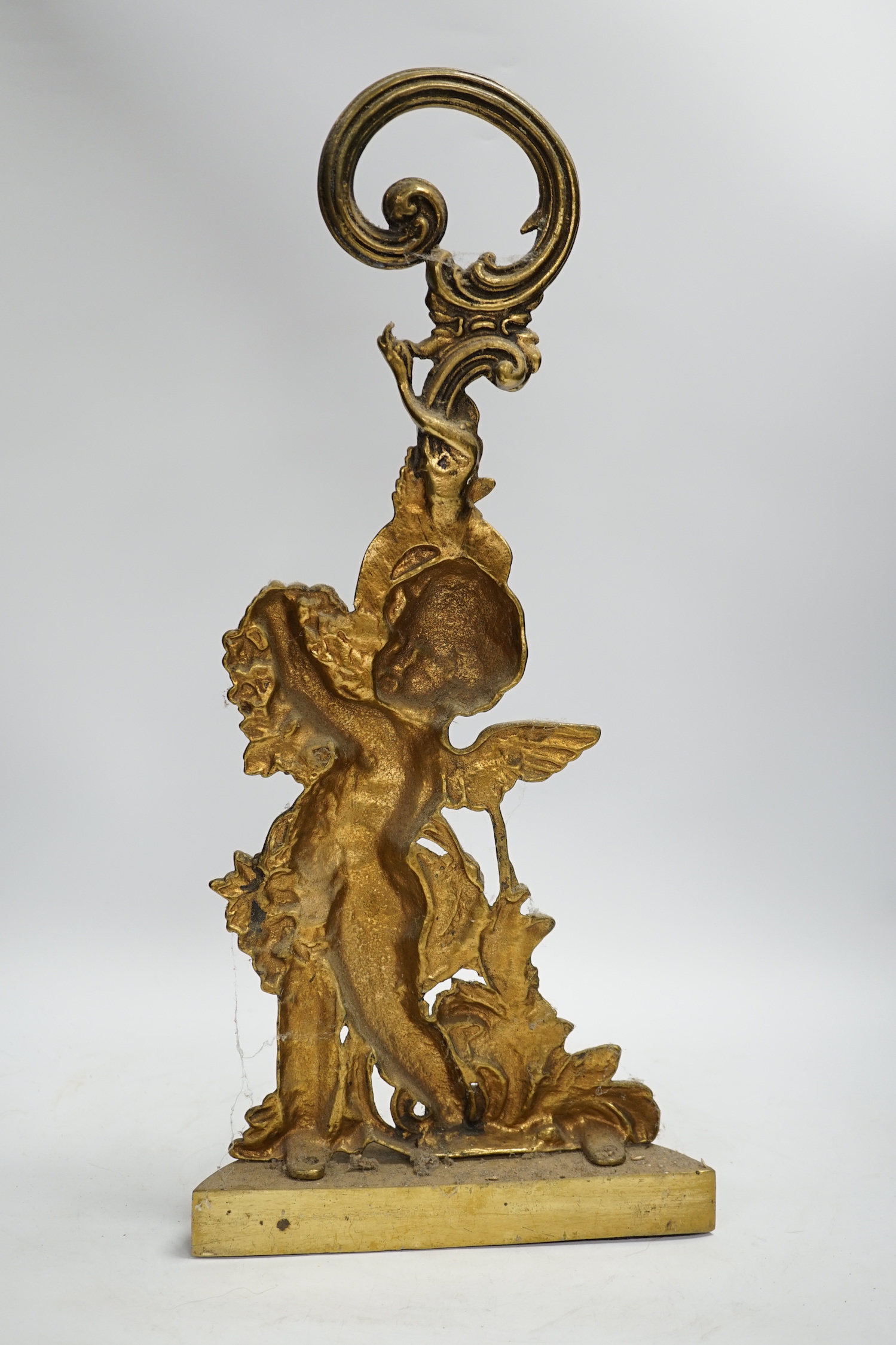 An Edwardian cast brass Cupid door porter, 49cm high